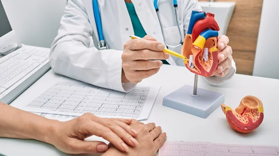 A cardiologist educates their patient about heart health management